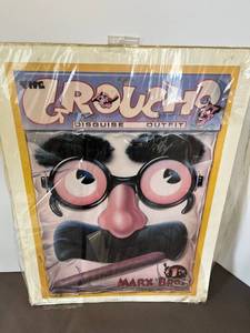 lot 40 image: Groucho poster and Animal Crackers poster