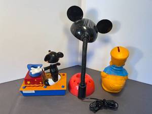 lot 48 image: Disneys Magician Mickey pop-up bank, Mickey Mouse lamp, Donald Duck custom bank