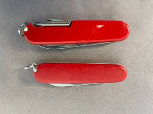 lot 71 image: two Swiss Army knives