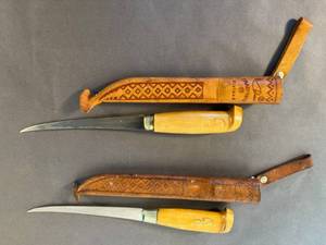 lot 72 image: two Rapula knives in leather sheaths made in Finland by J. Martthni