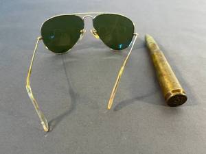 lot 76 image: vintage Ray Ban Aviators in great condition and a bullet