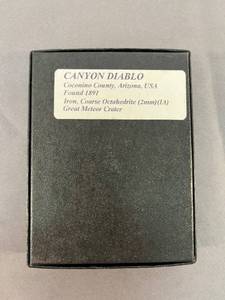 lot 79 image: boxed meteorite specimen from Arizona