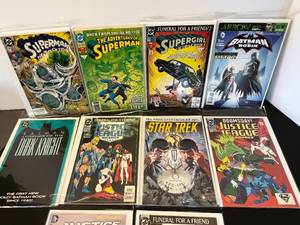 lot 101 image: 10 vintage comic books of Superman, Supergirl, Star Trek and more