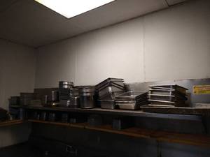 Shelf Full of Buffet Inserts & Pans