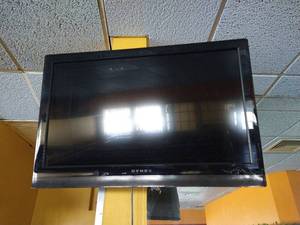 Dynex 32 Mounted TV