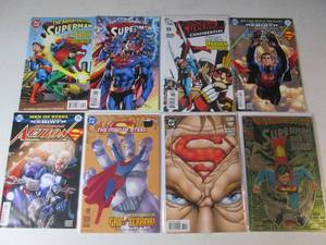 8 SuperMan Comics...
