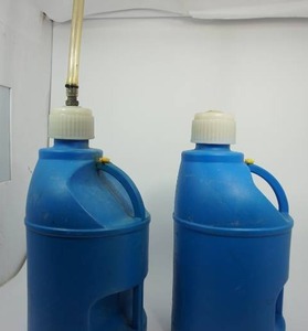 lot 66 image: Large Blue Plastic Liquid Storage Containers