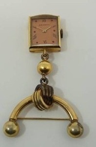 lot 129 image: Vintage Windup Lapel Ladies Watch