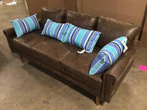 lot 3 image: Leather sofa and cushions slight damage review pictures