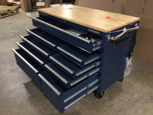 lot 7 image: Husky 52 in. W x 25 in. D Standard Duty 9-Drawer Mobile Workbench Cabinet with Solid Wood Top in Gloss Blue customer return review pictures