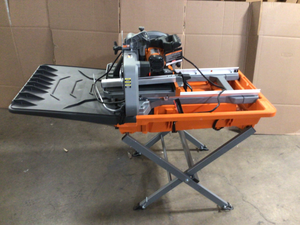 lot 30 image: Ridgid 8 12-Amp. Corded Wet Tile Saw with Stand see pictures