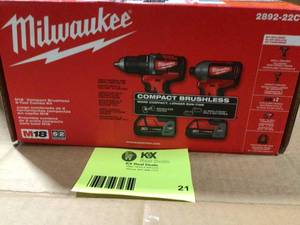 Milwakee M18 18V Lithium-Ion Brushless Cordless Compact DrillImpact Combo Kit (2-Tool) W (2) Batteries, Charger & Bag customer return review pictures