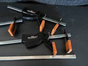 lot 29 image: 4 EZ Hold Bar and Spreader Clamps