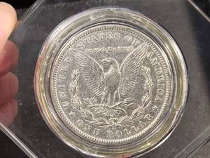 1886-O MORGAN SILVER DOLLAR IN AIRTITE
