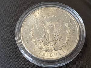 1885 MORGAN SILVER DOLLAR UNC IN AIRTITE