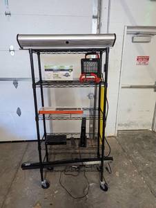 Assorted Items on Rack, DOES NOT INCLUDE SHELFS  See pictures - Pull Down Screen, etc