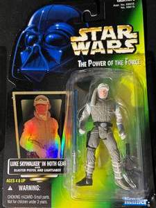 lot 38 image: Star Wars Power of the Force Action Figures - Greedo, Luke Skywalker New in Package