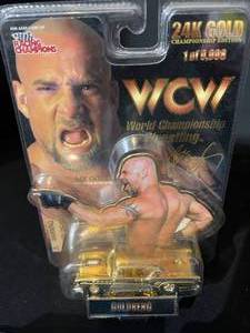 lot 71 image: WCW 24K Goldberg Edition Car, Hot Wheels Car Sets New in Package