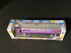 lot 102 image: PEZ - 1958 Chevrolet Spartan LCF & 1957 150 Handyman Station Wagon