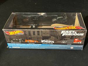 lot 106 image: Fast & Furious Set of 4 Hot Wheels - New in Package