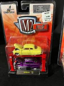 lot 109 image: M2 Machines Auto-Lift 2 Packs VW & Mercury - New in Package