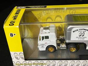 lot 115 image: M2 Machines Go With Moon  1964 Ford C-950 Truck & 1966 Ford Mustang Flashback - New in package