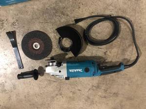 Makita  15 Amp 7 in. Corded Angle Grinder with Grinding wheel customer return review pictures