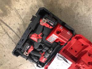 Milwaukee  M18 FUEL 18V Lithium-Ion Brushless Cordless SURGE Impact and Hammer Drill Combo Kit customer return used in working condition