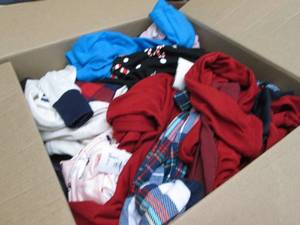 lot 33 image: Box of NWT Clothes including Holida...