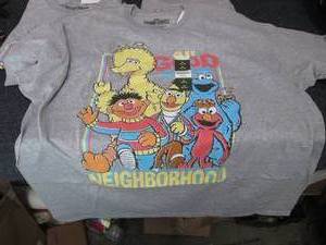lot 81 image: 4 Sesame Street Tshirts XL...