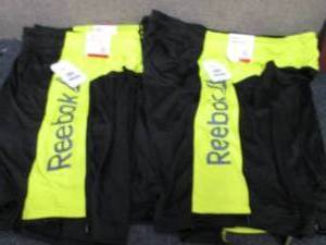 lot 86 image: 4 Reebock 9 inch Slim Athletic Shor...