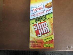 lot 425 image: Box of 18- 1.94 oz Slim Jim Monster...