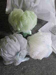 4 new bags of 3 shower puffs ...