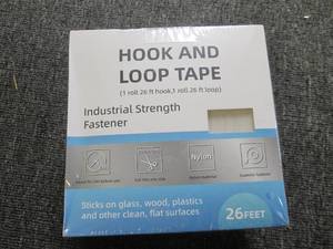 new box of 26ft of hook and loop ta...