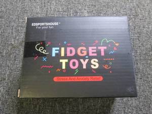 new box of fidget toys and a triang...
