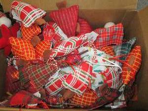 box of holiday time ornaments and m...