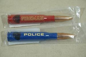 lot 214 image: Police and Fireman Repurposed Bullet Bottle Openers