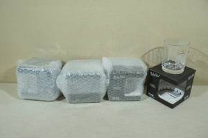 lot 235 image: Lucky Shot Rocks Glasses with Embedded Bullets - We the People