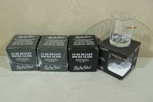 lot 236 image: Lucky Shot Rocks Glasses with Embedded Bullets - Iwo Jima
