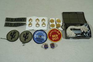 lot 241 image: Assorted Patches, Pins, and Gun Cleaning Kit