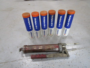 (6) Grease Tubes & Grease Gun