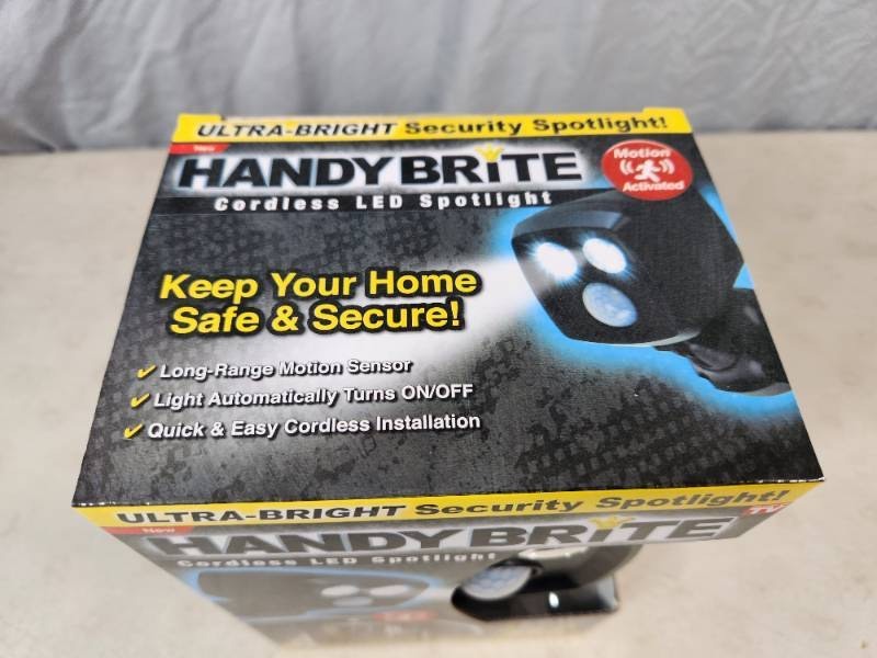 lot 90 image: New LED Cordless Spotlight