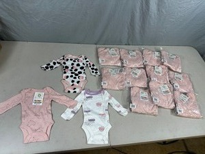lot 148 image: 36 New Lamaze Organic Newborn Outfits