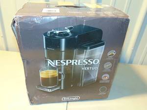 lot 101 image: Nespresso Vertuo Coffee and Espresso Machine -ENV135GY