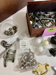 lot 53 image: Metals Handles, lamp tops, Clock