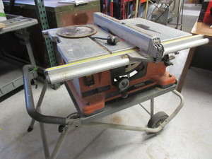 lot 153 image: RIGID PORTABLE TABLE SAW