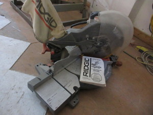 lot 156 image: RIDGID COMPOUND MITER SAW WITH LEGSET AND MANUAL