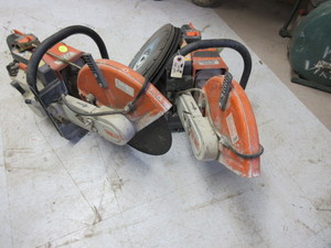 lot 164 image: STIHL CUT OFF SAW WITH EXTRA BLADES AND A SAW FOR PARTS