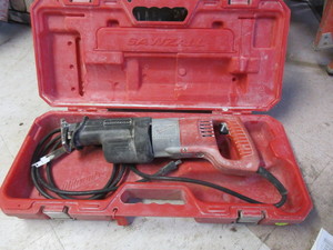 lot 168 image: MILWAUKEE SAWZALL WITH CASE AND MANUAL