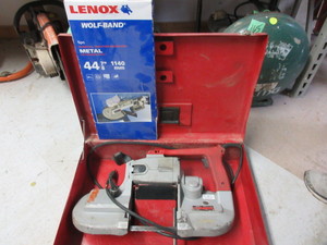 lot 182 image: MILWAUKEE HEAVY DUTY BAND SAW WITH SPARE BLADES AND CASE
